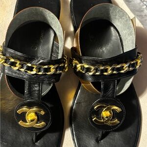 CHANEL Black Sandals with Gold Chain Accent